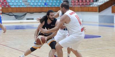 Çekişmeli maçta kazanan Koopspor: 57-52