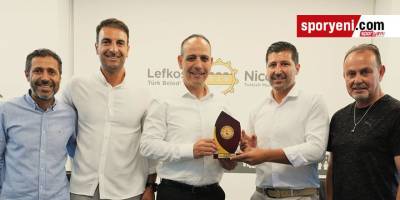 Cimnastik Federasyonu’ndan Harmancı’ya plaket